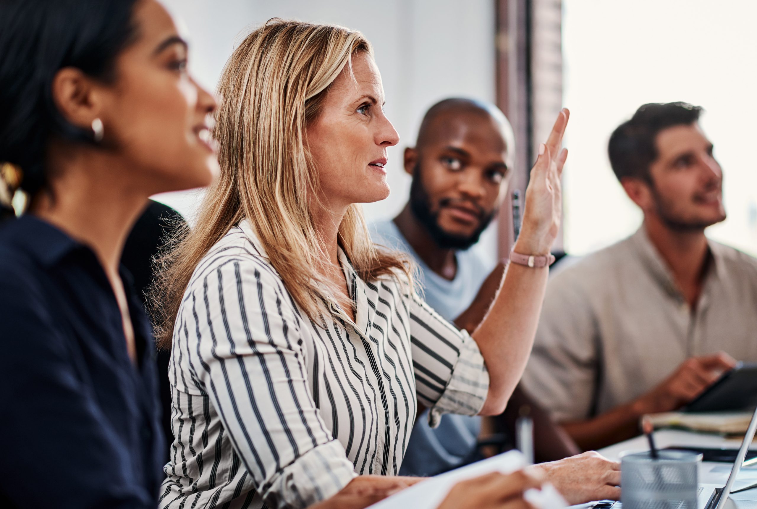 office meeting business people with questions workshop project development growth planning ideas support team conference room proposal objectives employee engagement scaled.jpg